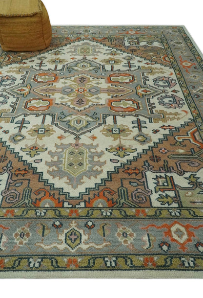 Custom Made Ivory, Silver, Peach and Olive Hand Knotted Traditional Heriz wool Area Rug.