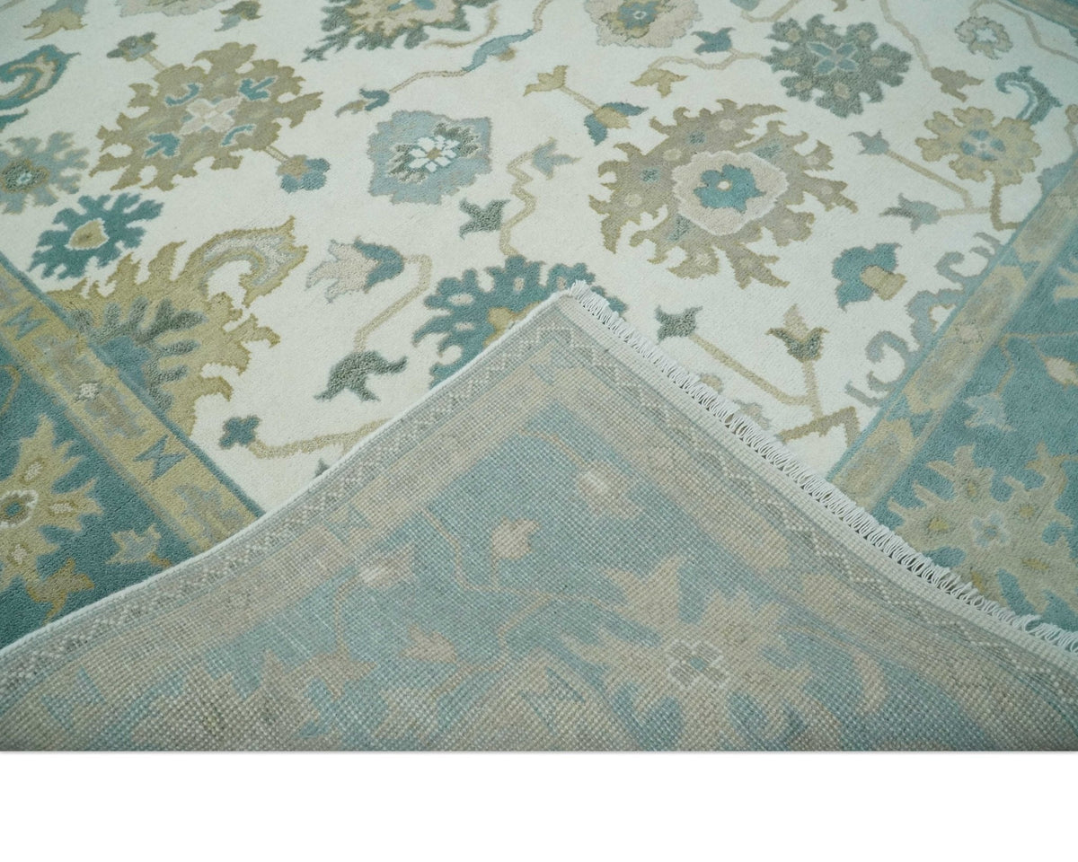 Custom Made Ivory, Teal and Beige Floral Hand Knotted Traditional Oushak Wool Area Rug.