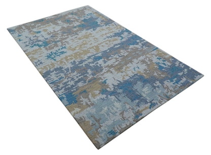 Custom Made Modern Abstract Blue And Beige Hand Tufted Wool Area Rug.