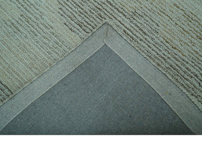 Custom Made Modern Abstract Design Ivory, Blue and Brown Hand Tufted Wool Area Rug.