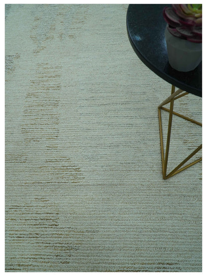 Custom Made Modern Abstract Design Ivory, Blue and Brown Hand Tufted Wool Area Rug.
