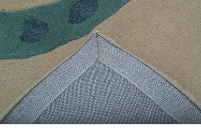 Custom Made Modern Animal Pattern Teal And Beige Hand Tufted Wool Area Rug.