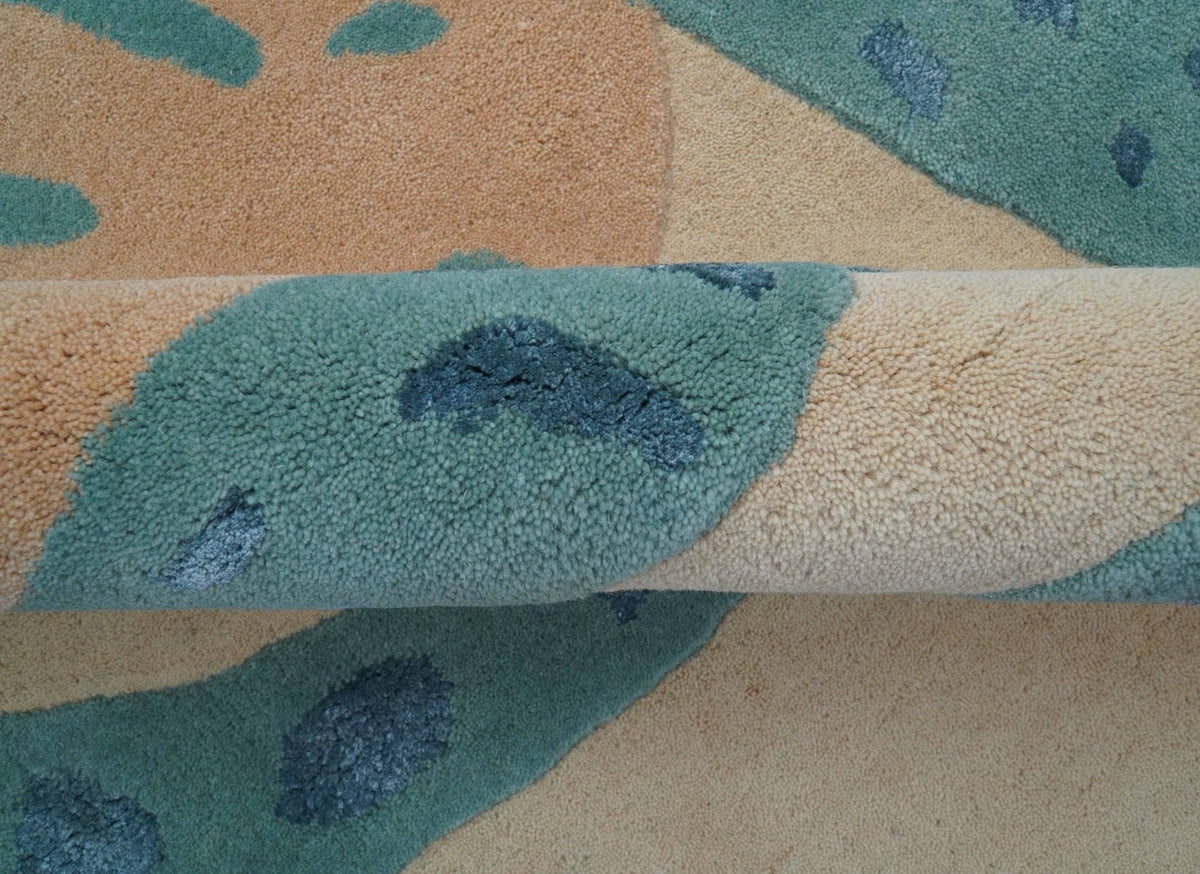 Custom Made Modern Animal Pattern Teal And Beige Hand Tufted Wool Area Rug.