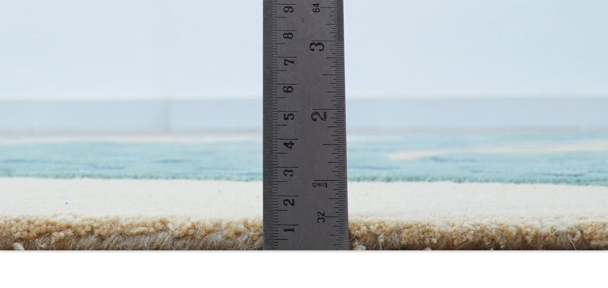 Custom Made Modern Animal Pattern Teal And Beige Hand Tufted Wool Area Rug.
