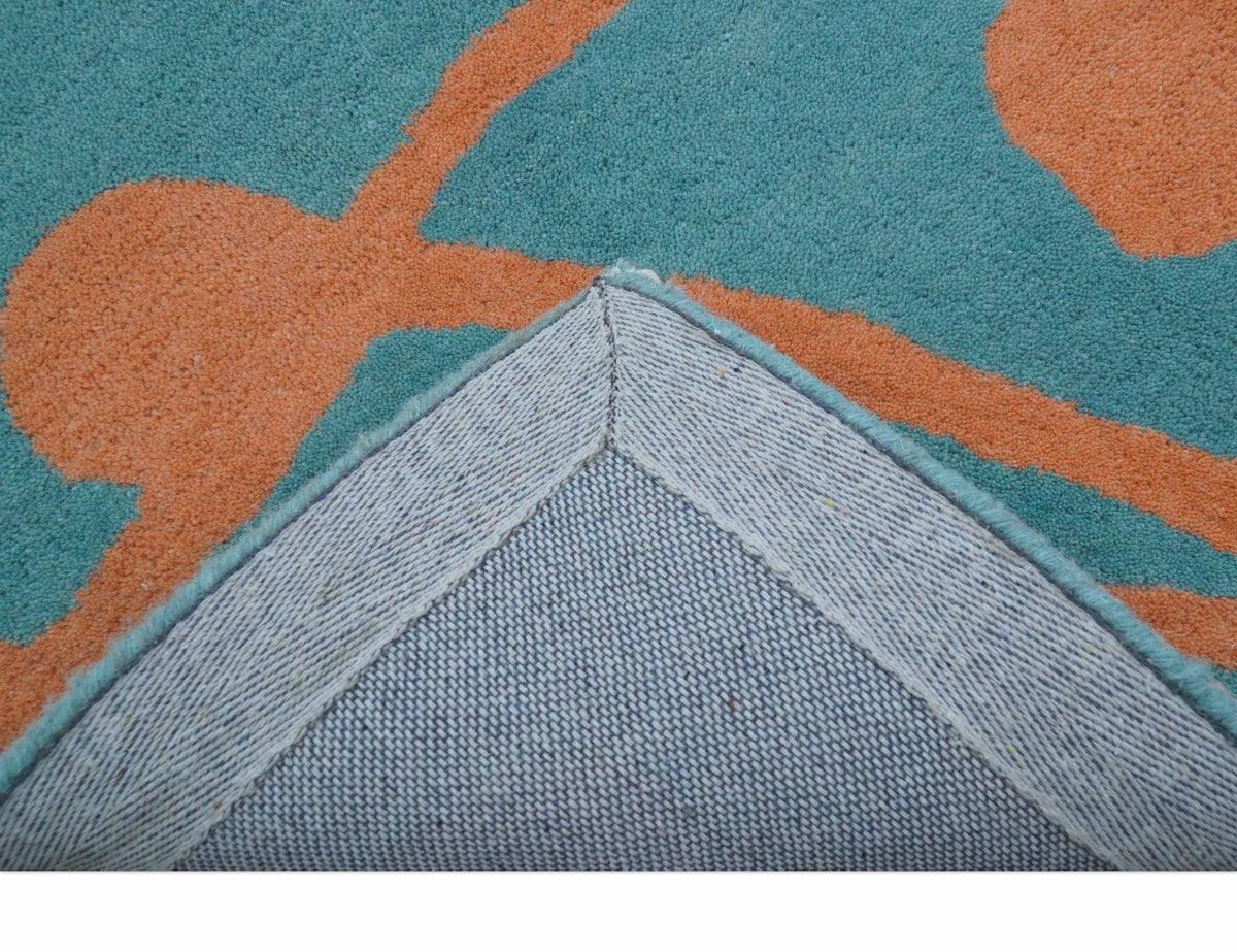 Custom Made Modern Floral Design Blue Hand Tufted Wool Area Rug.