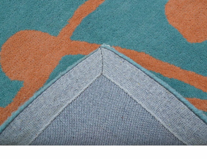 Custom Made Modern Floral Design Blue Hand Tufted Wool Area Rug.