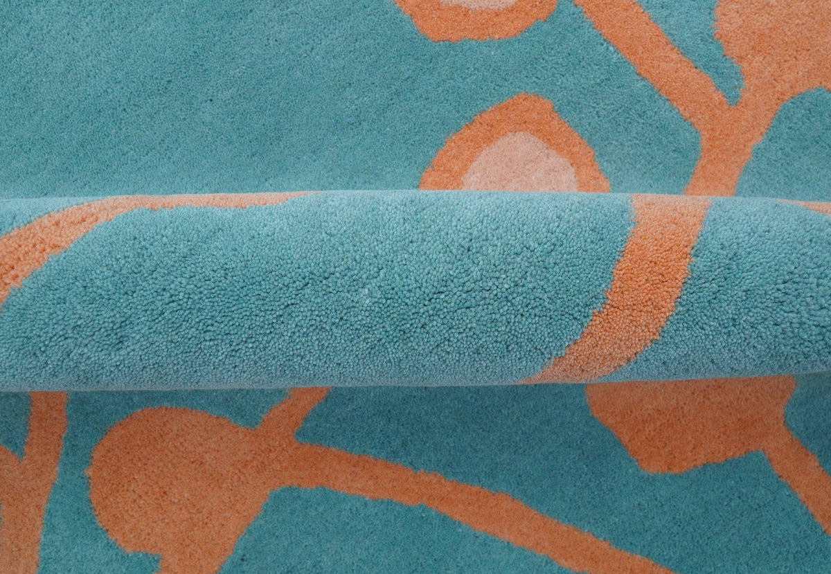 Custom Made Modern Floral Design Blue Hand Tufted Wool Area Rug.