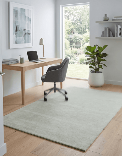 Custom Made Modern Solid Ivory Hand Tufted Wool Rug.