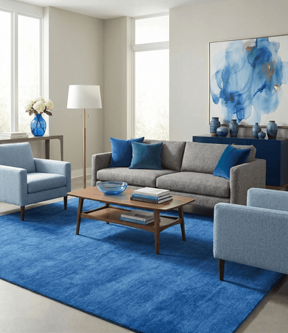 Custom made solid Blue Woolen Hand Tufted contemporary area Rug.