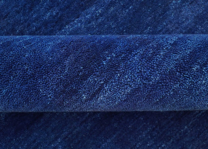 Custom Made Solid Modern Blue Hand Tufted thick Wool Area Rug.