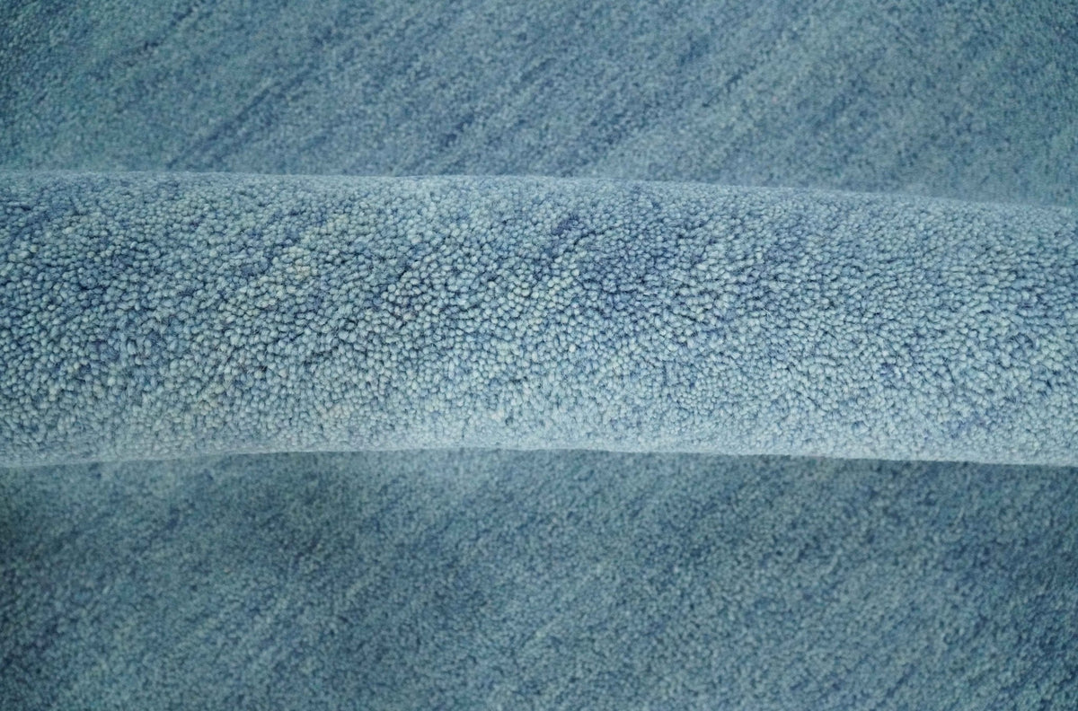 Custom Made Solid Plane Light Blue Woolen Hand Tufted wool area Rug.