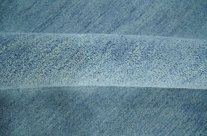 Custom Made Solid Plane Light Blue Woolen Hand Tufted wool area Rug.