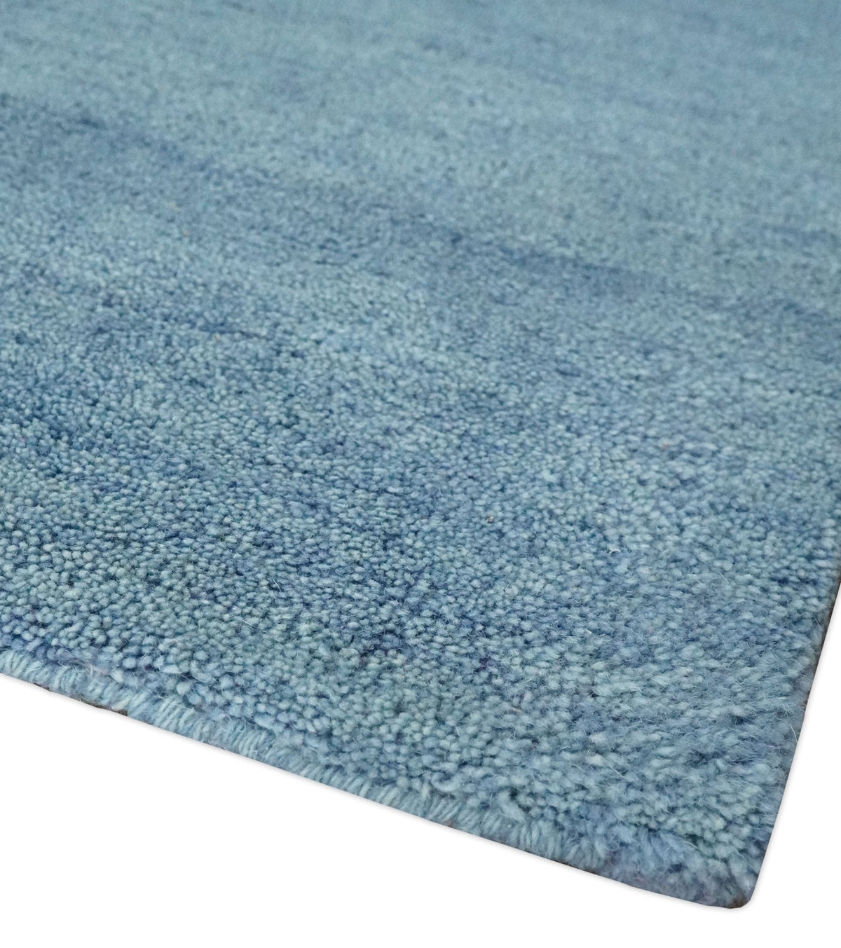 Custom Made Solid Plane Light Blue Woolen Hand Tufted wool area Rug.