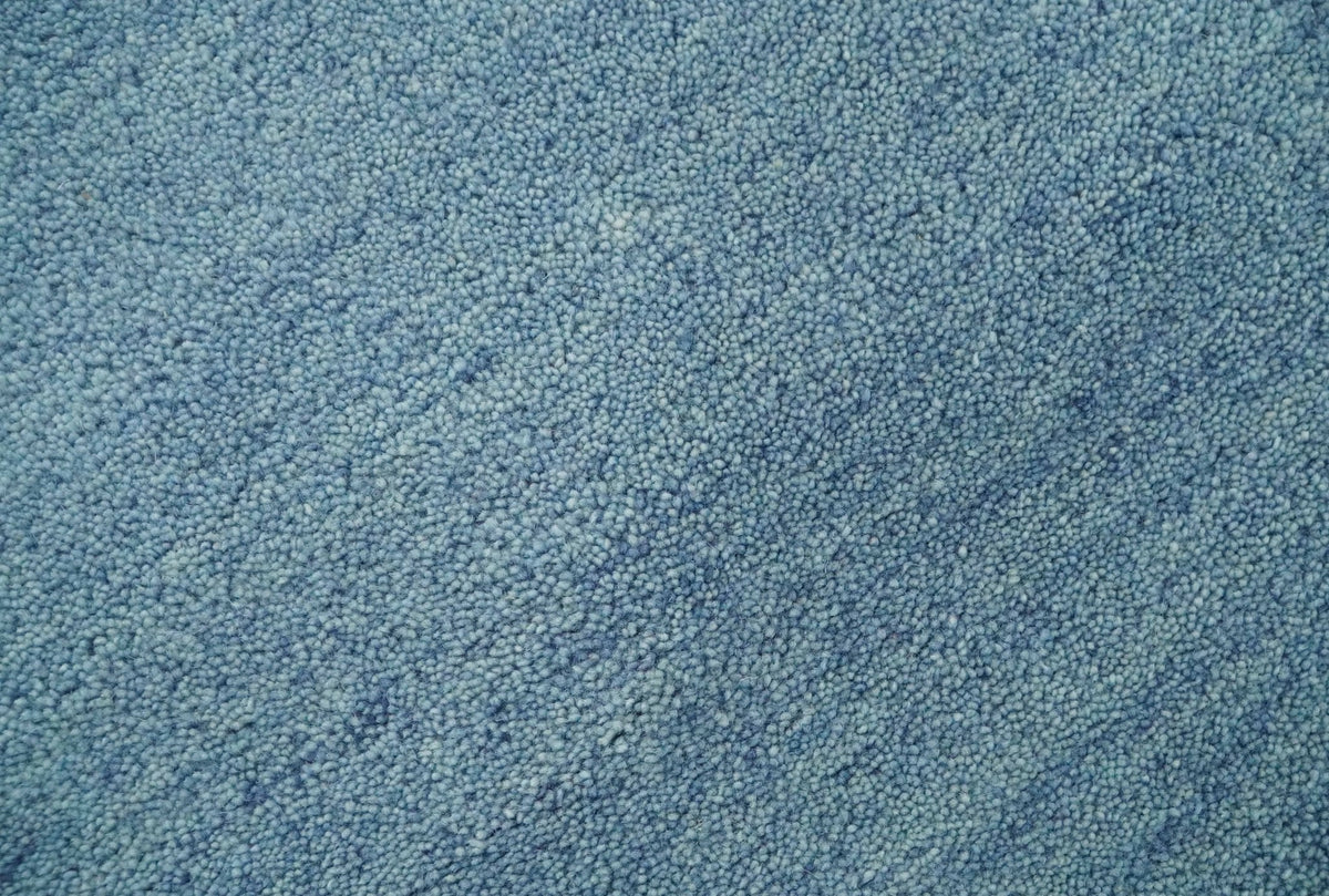 Custom Made Solid Plane Light Blue Woolen Hand Tufted wool area Rug.