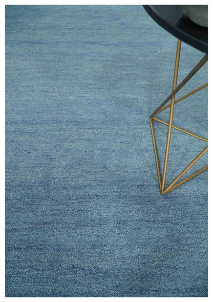 Custom Made Solid Plane Light Blue Woolen Hand Tufted wool area Rug.