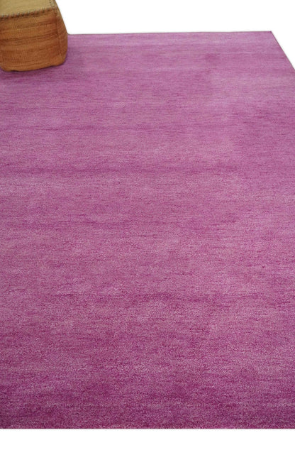 Custom made Solid Plane Orchid Woolen Hand Tufted Multi Size wool area Rug.