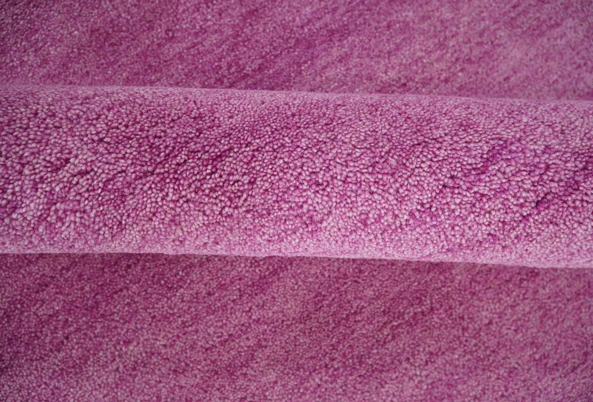 Custom made Solid Plane Orchid Woolen Hand Tufted Multi Size wool area Rug.