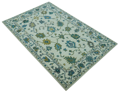 Custom Made Traditional Ivory And Blue Oushak Hand Tufted Wool Area Rug.
