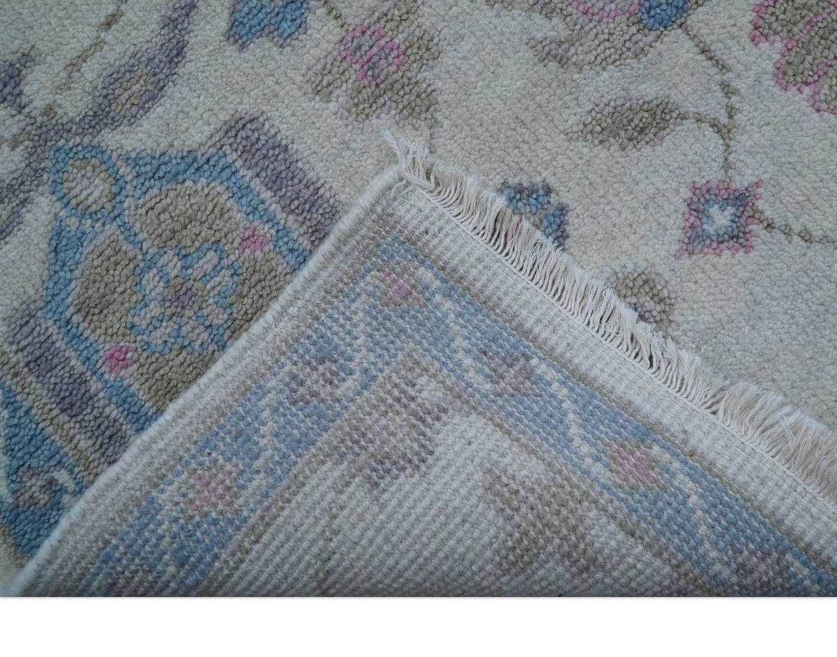 Custom Made Traditional Style Ivory And Blue Hand Knotted Wool Area Rug.