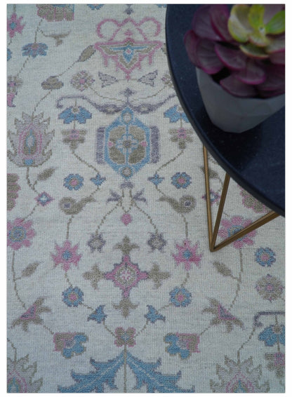 Custom Made Traditional Style Ivory And Blue Hand Knotted Wool Area Rug.