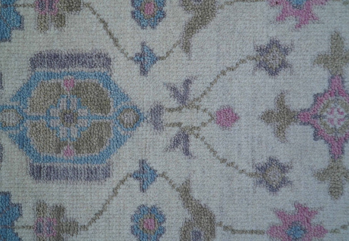 Custom Made Traditional Style Ivory And Blue Hand Knotted Wool Area Rug.