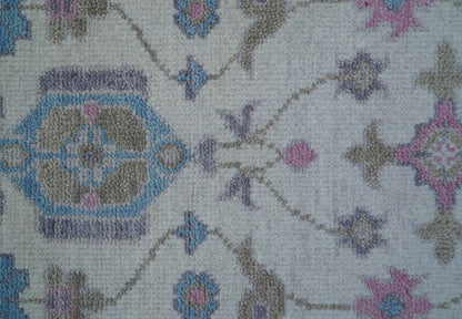 Custom Made Traditional Style Ivory And Blue Hand Knotted Wool Area Rug.