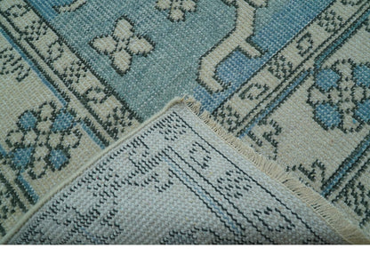 Custom Made Traditional Turkish Blue And Ivory Hand Knotted Wool Area Rug.