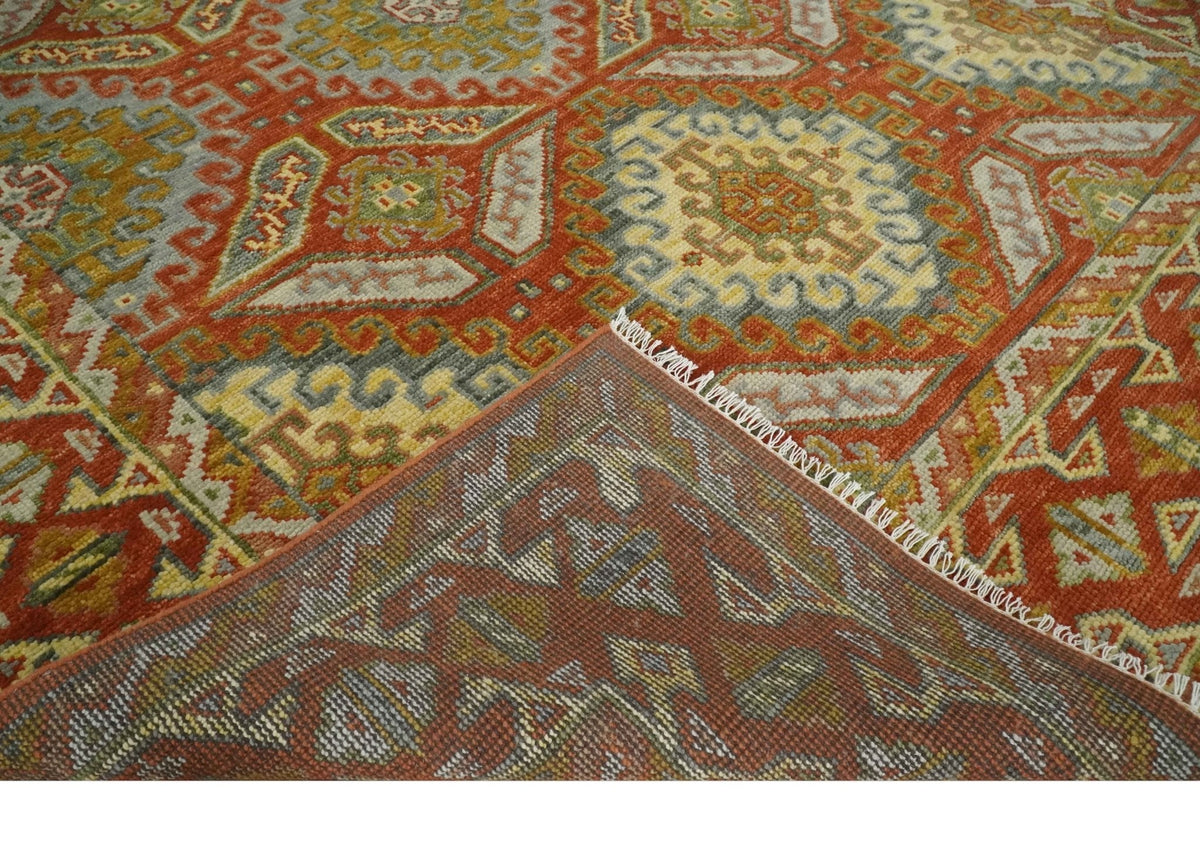 Custom Made Tribal Motifs Hand Knotted Rust, Gold and Blue Oriental Traditional Wool Area Rug.