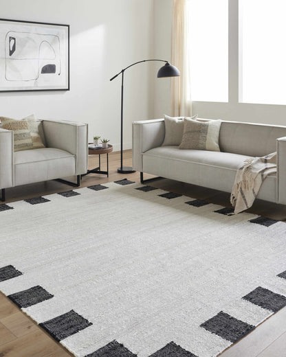 Rocio Dotted Bordered White Jute Carpet.