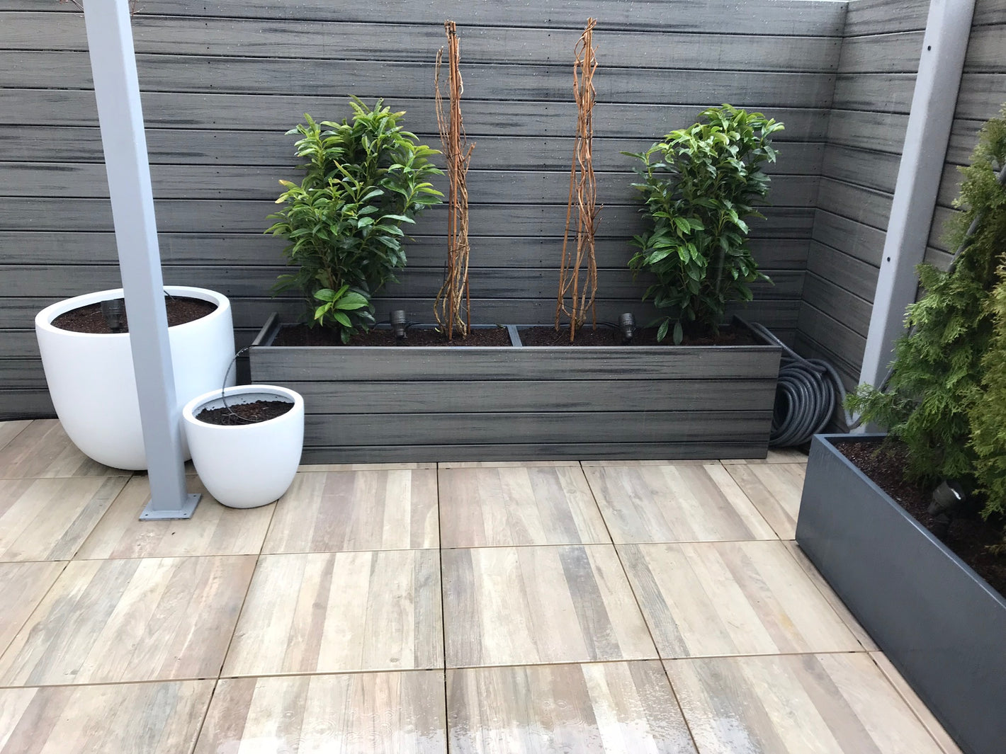 Outdoor rooftop deck and planter created by TCSC