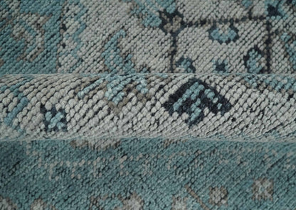 Distressed Hand Knotted Multi Size Blue, Silver and Charcoal Traditional Low Pile Wool Area Rug.