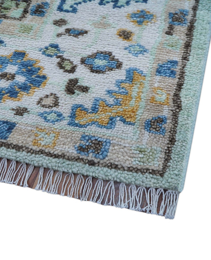 Ellie Hand Knotted Light Green And Ivory Turkish Design Wool Rug.