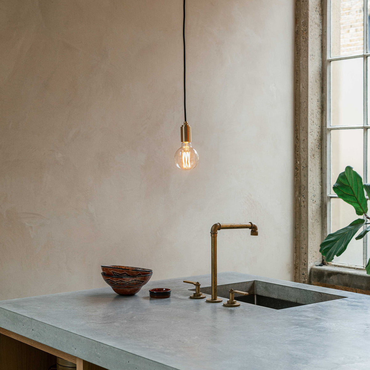 Elva Pendant Light Tinted in Graphite.