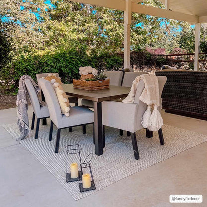 Beige Braided Faux Jute Outdoor Rug.