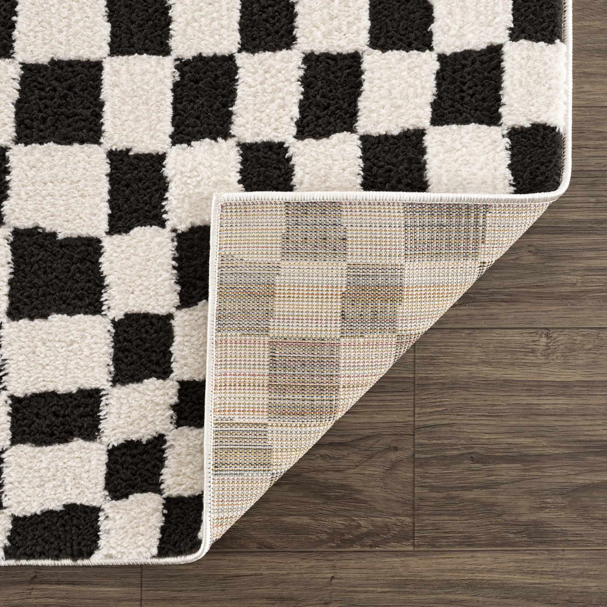Lajos Black & White Checkered Plush Rug.