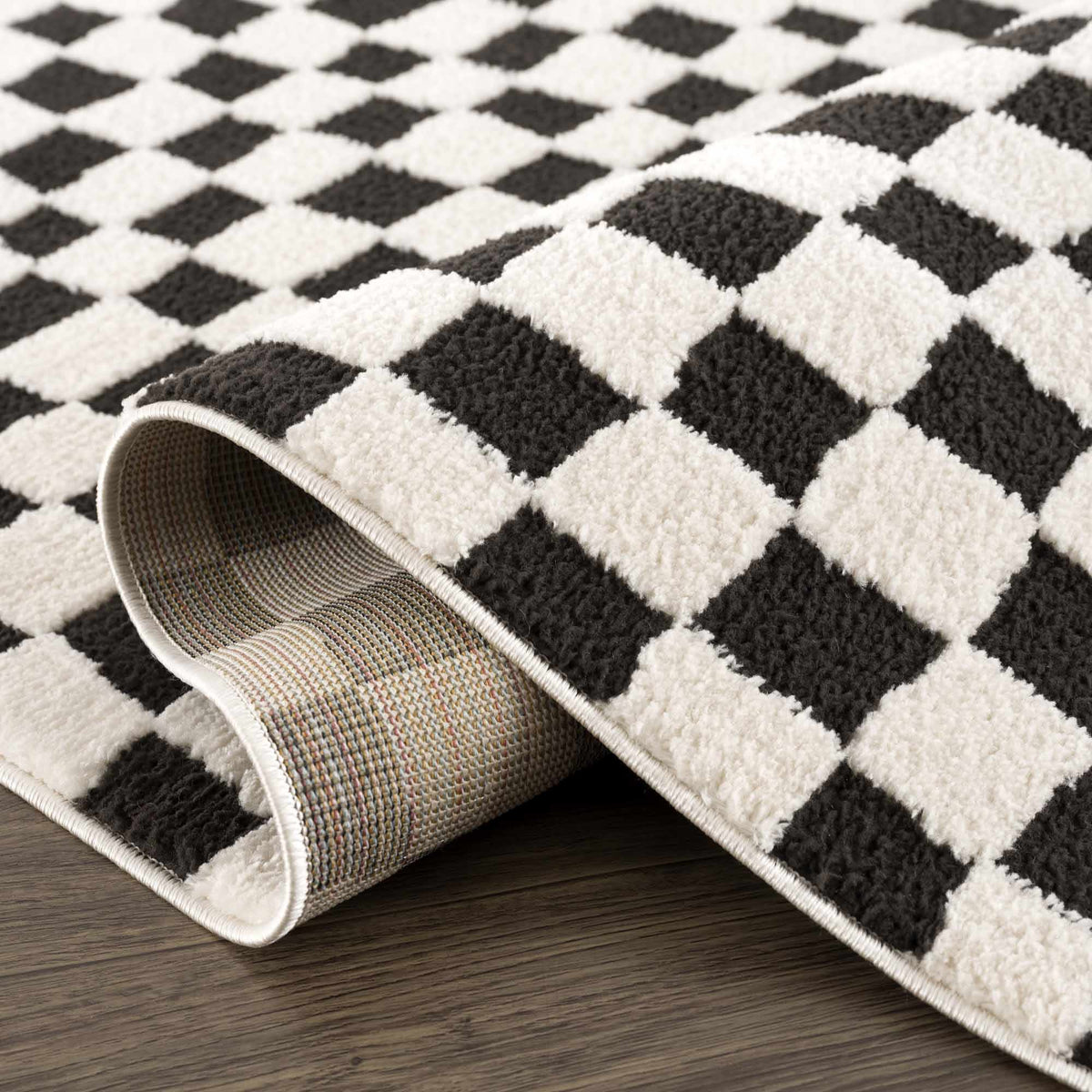 Lajos Black & White Checkered Plush Rug.
