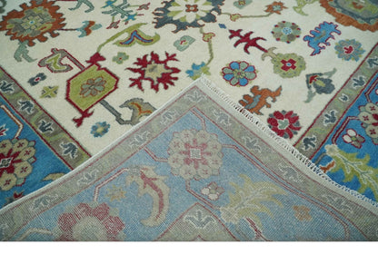 Fine Traditional Ivory and Blue Colorful Hand knotted Oushak Wool Area Rug.