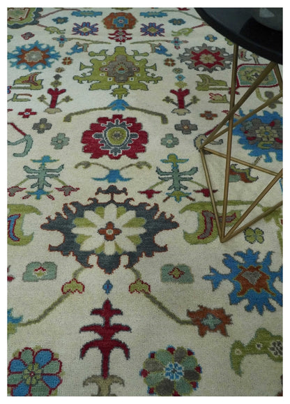Fine Traditional Ivory and Blue Colorful Hand knotted Oushak Wool Area Rug.