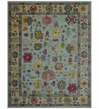 Fine Traditional Ivory and Blue Colorful Hand knotted Oushak Wool Area Rug.