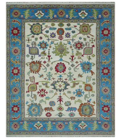 Fine Traditional Ivory and Blue Colorful Hand knotted Oushak Wool Area Rug.