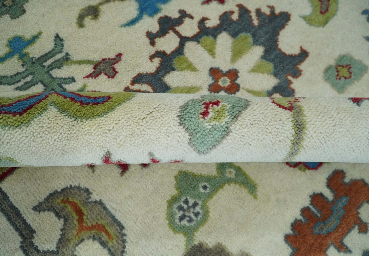 Fine Traditional Ivory and Blue Colorful Hand knotted Oushak Wool Area Rug.