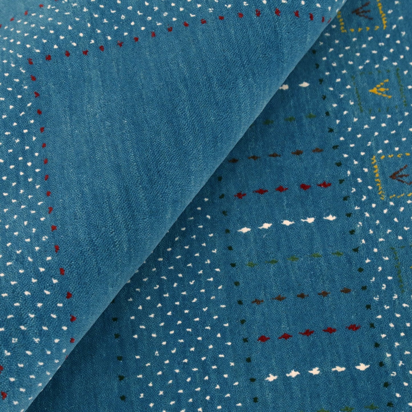 Gabbeh Design Hand Loomed Wool Area Rug.