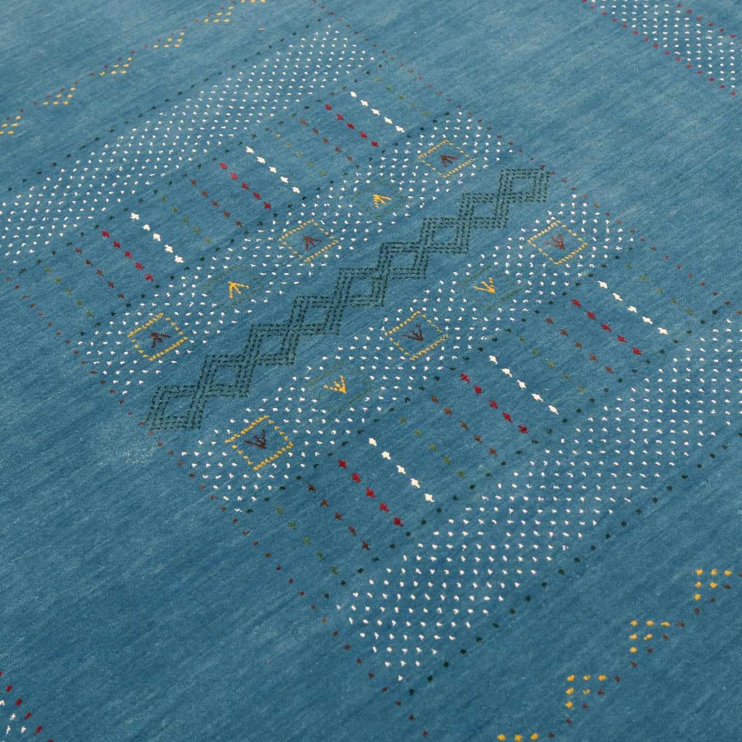 Gabbeh Design Hand Loomed Wool Area Rug.