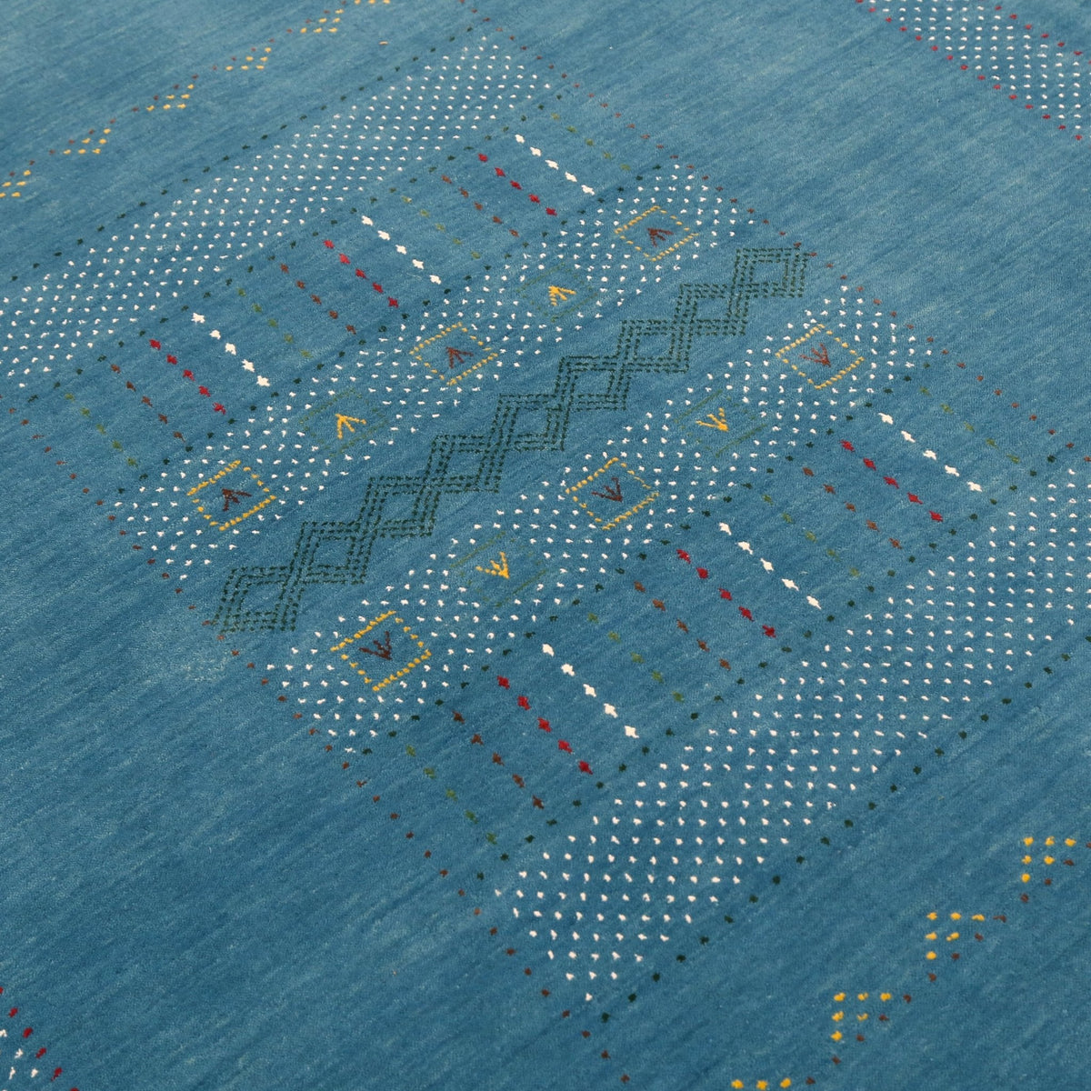 Gabbeh Design Hand Loomed Wool Area Rug.