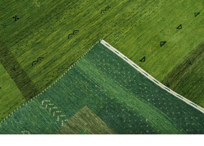 Geometrical Stripes Design Green Hand loom Multi Size wool Area Rug.