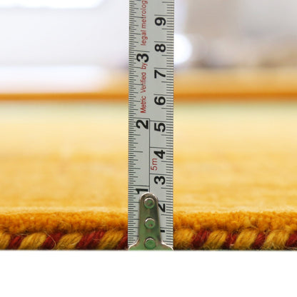 Gold Center Pattern Hand Loomed Wool Area Rug.