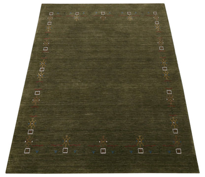 Green Tribal Border Design Hand Loomed Wool Area Rug.