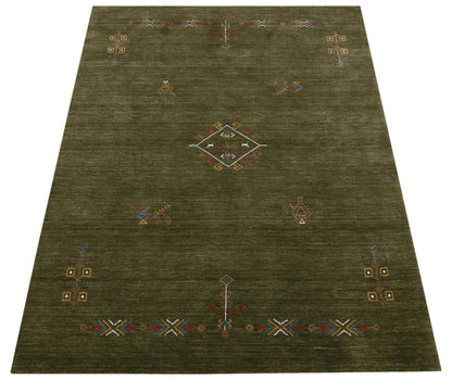 Green Tribal Center Medallion Hand Loomed Wool Area Rug.