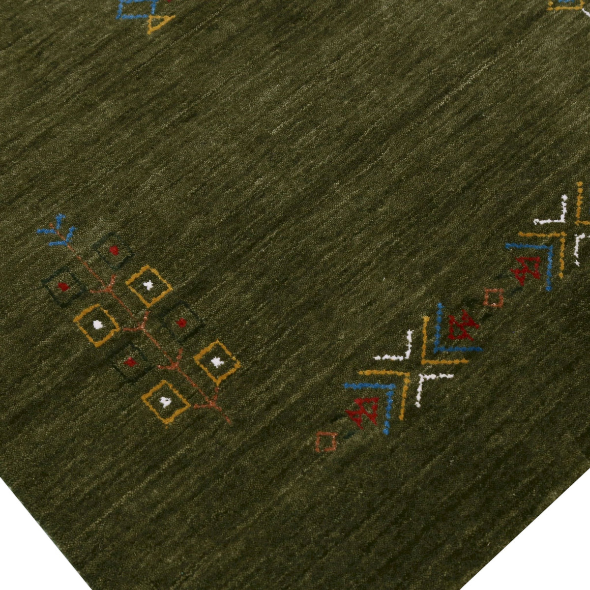 Green Tribal Center Medallion Hand Loomed Wool Area Rug.