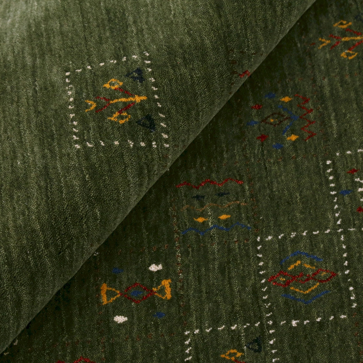 Green Tribal Design Hand Loomed Wool Area Rug.